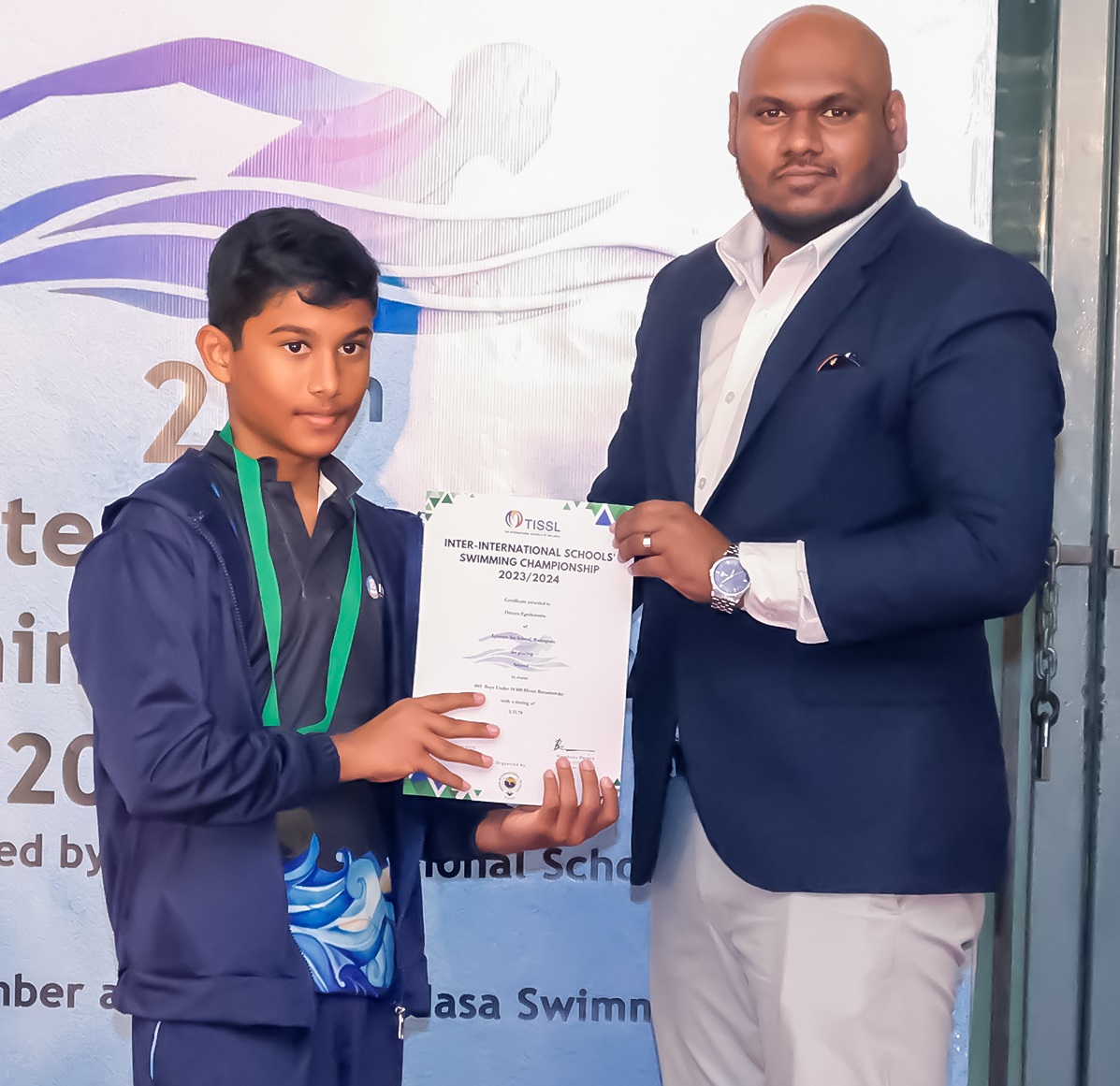 Young swimmer receiving certificate at 21st International Swimming Championship 2019.