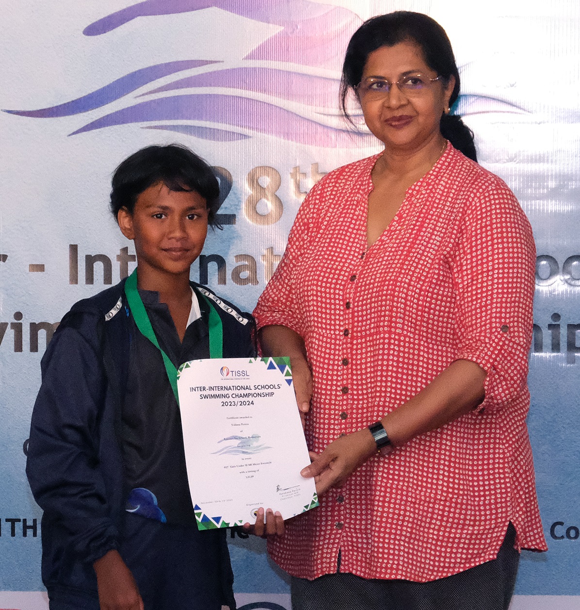 Young swimmer receives award at 28th Inter-School Swimming Championship 2018.