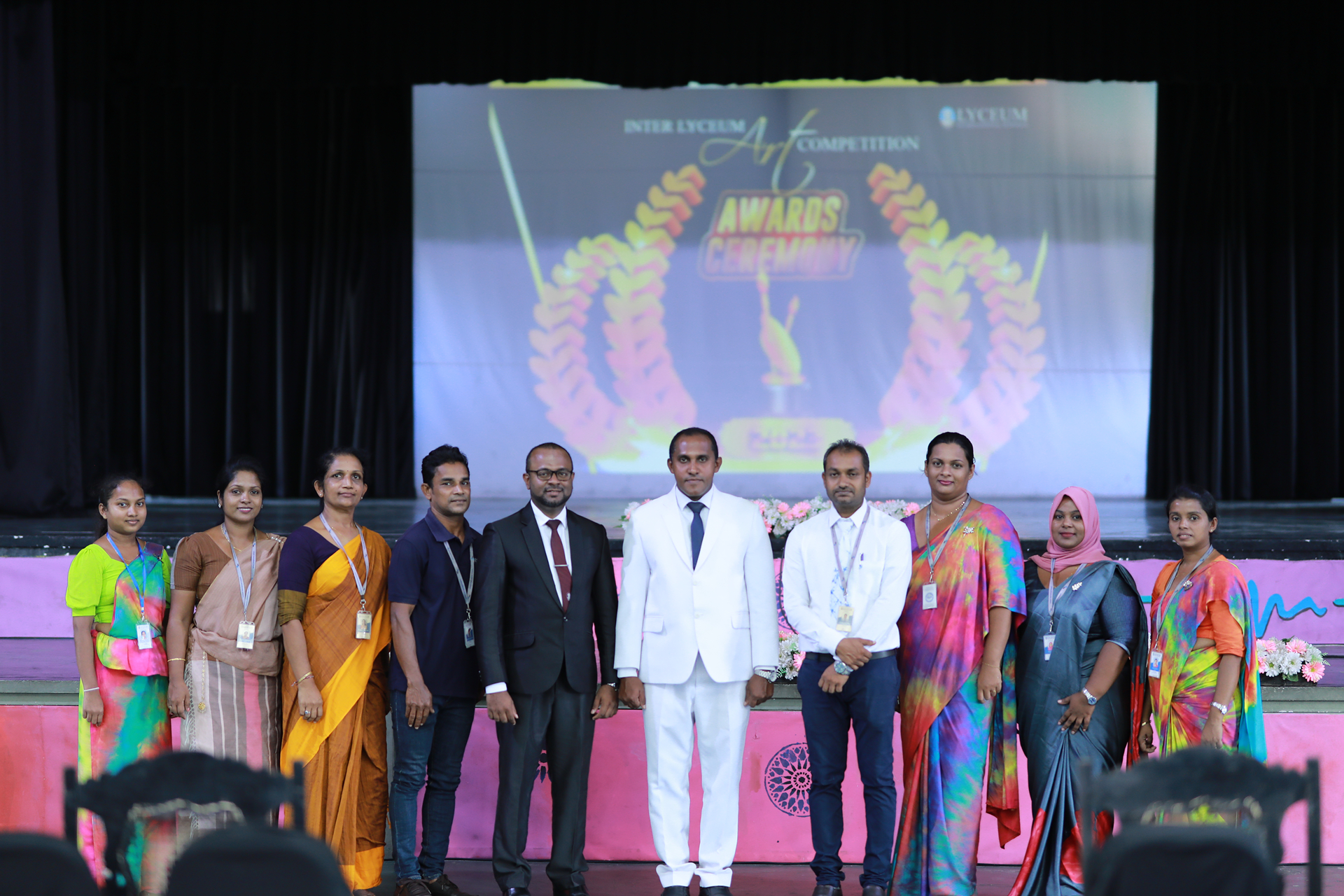 Ten awardees on stage at the Inter Lyceum Art Competition Awards Ceremony 2023.