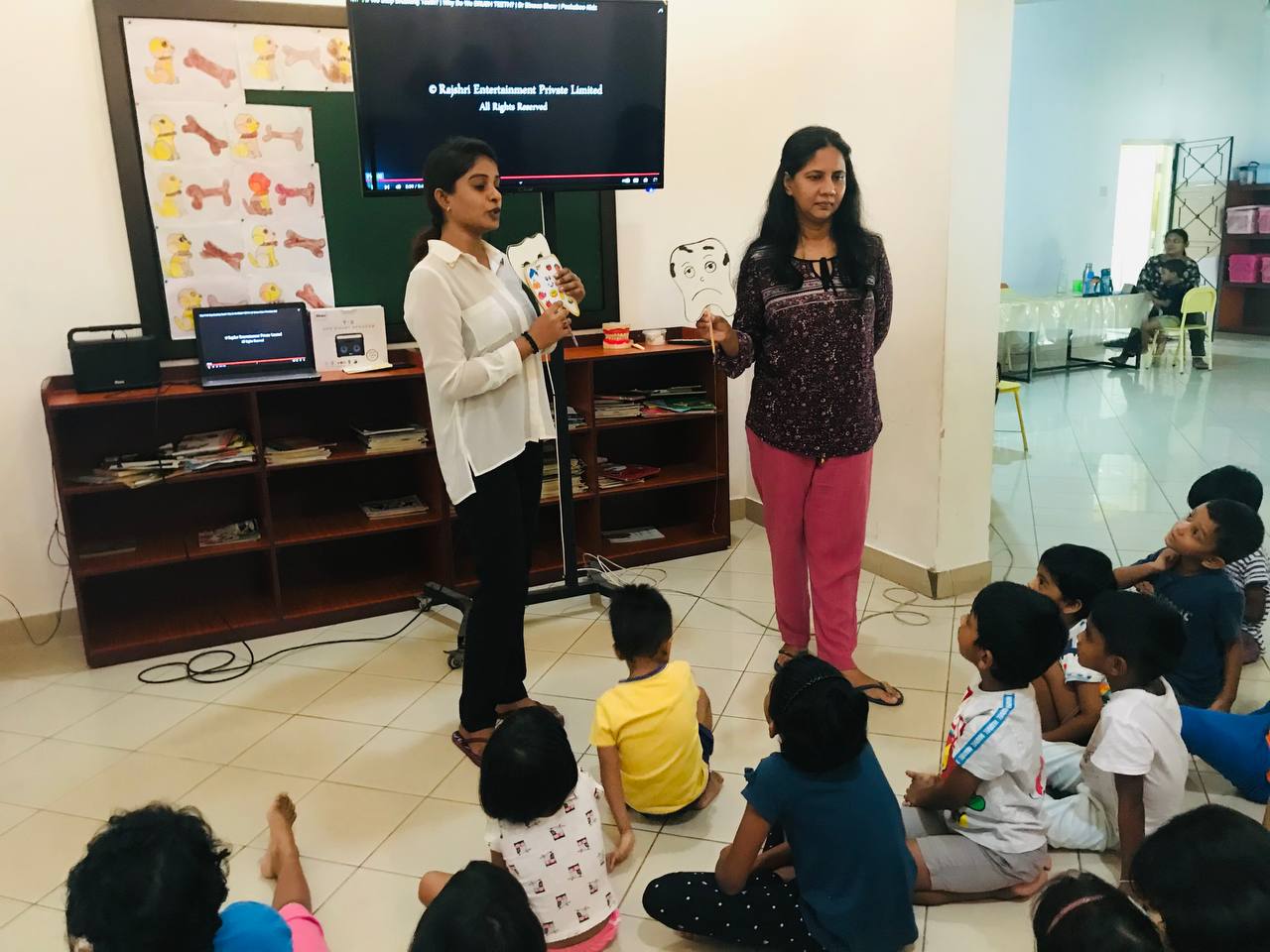 Interactive storytelling session for kids in a classroom setting.