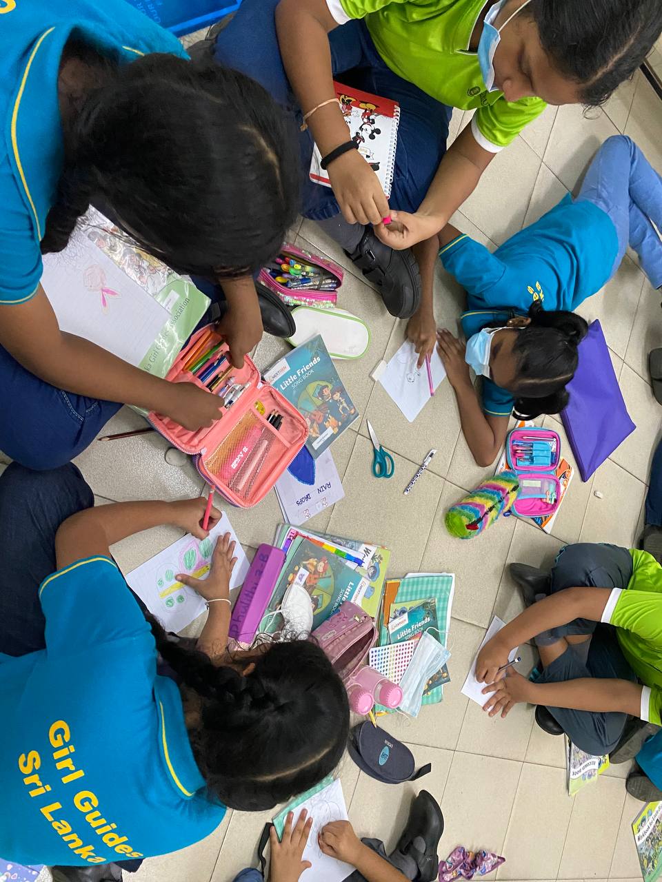 Young Girl Guides crafting together during COVID-19.