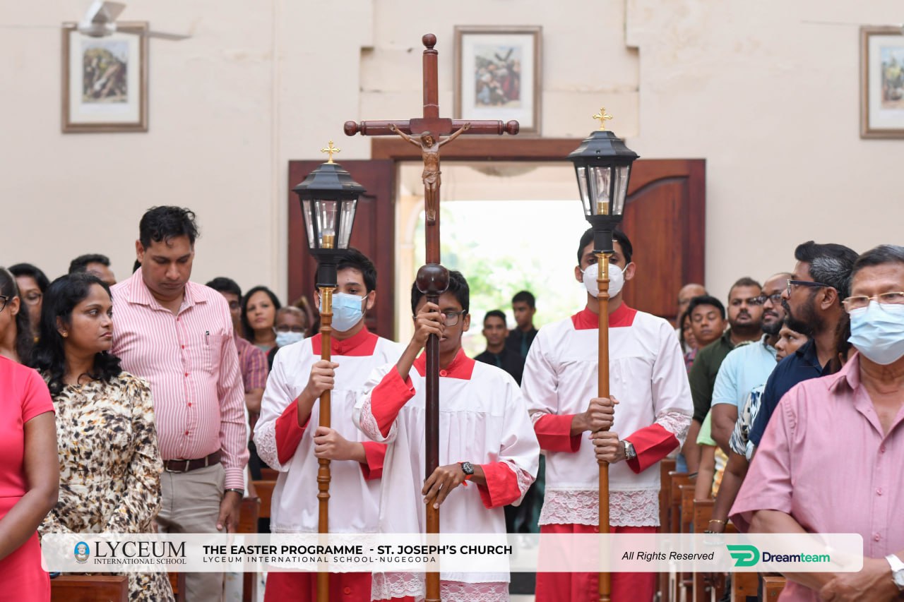 Easter procession at St. Josephs Church with altar servers and congregation.