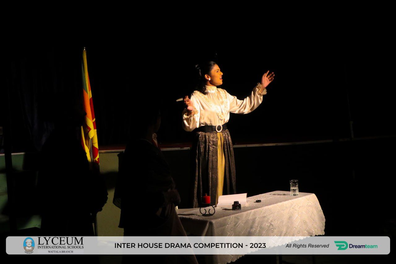 Student performs passionately on stage during Lyceum 2023 Drama Competition.