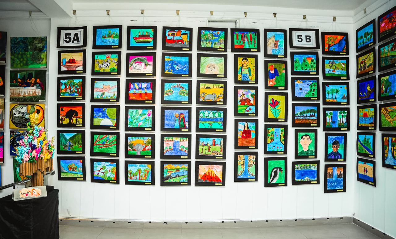 Vibrant Classroom Creations: Art by Students of 5A and 5B Colorful childrens art exhibition showcasing vibrant paintings from classrooms 5A and 5B.