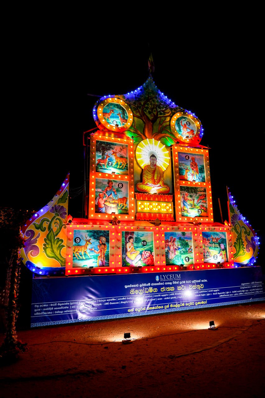 Illuminated Buddha Shrine at Cultural Festival Illuminated Buddha shrine with vibrant lights and narrative scenes at cultural festival.