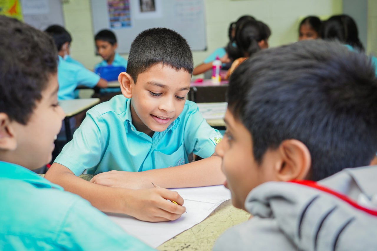 Engaged Students in a Collaborative Classroom Activity Students collaboratively engaged in a lively classroom discussion.
