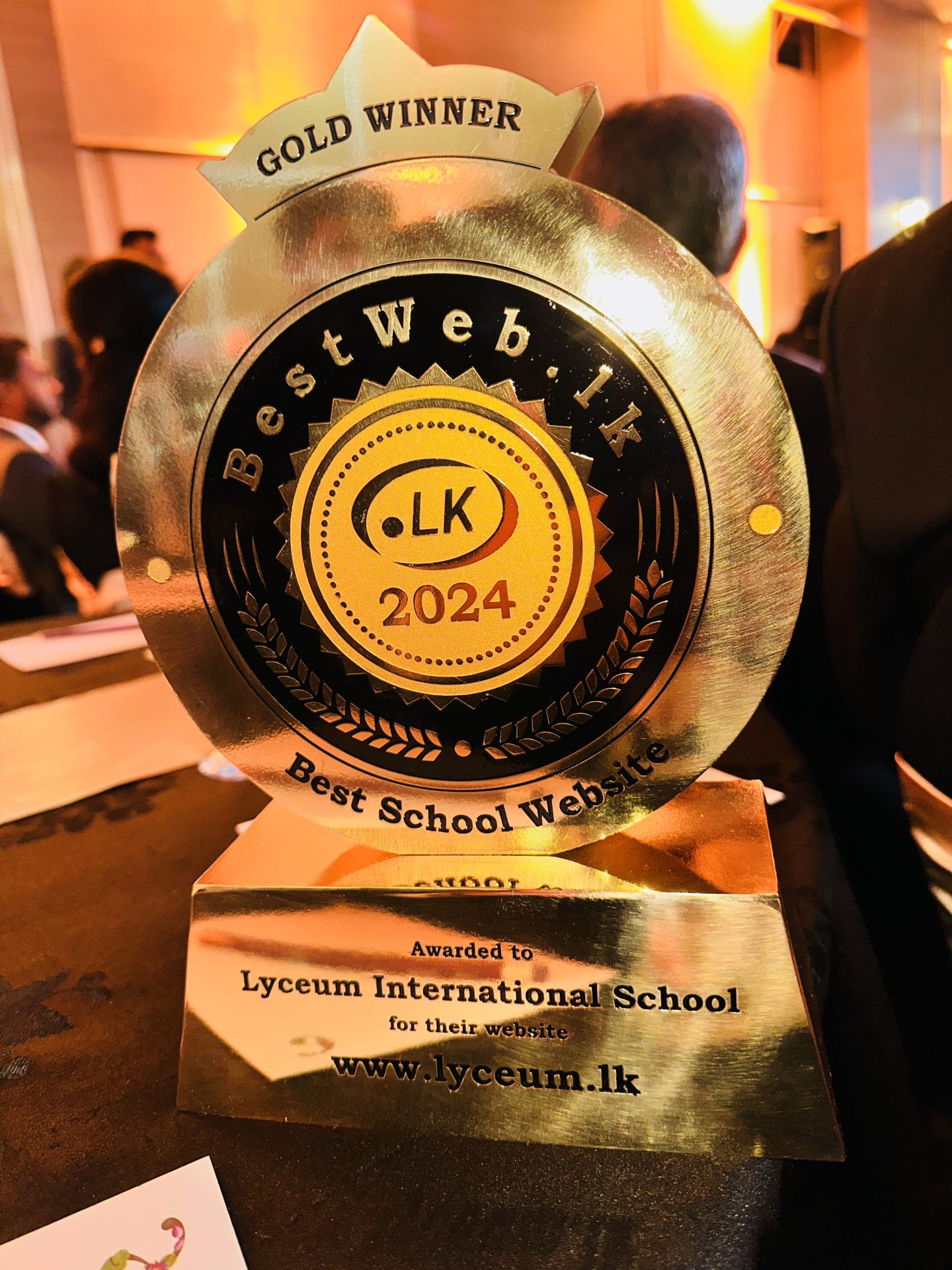 Gold trophy awarded to Lyceum International for Best School Website 2024 by BestWeb.lk.