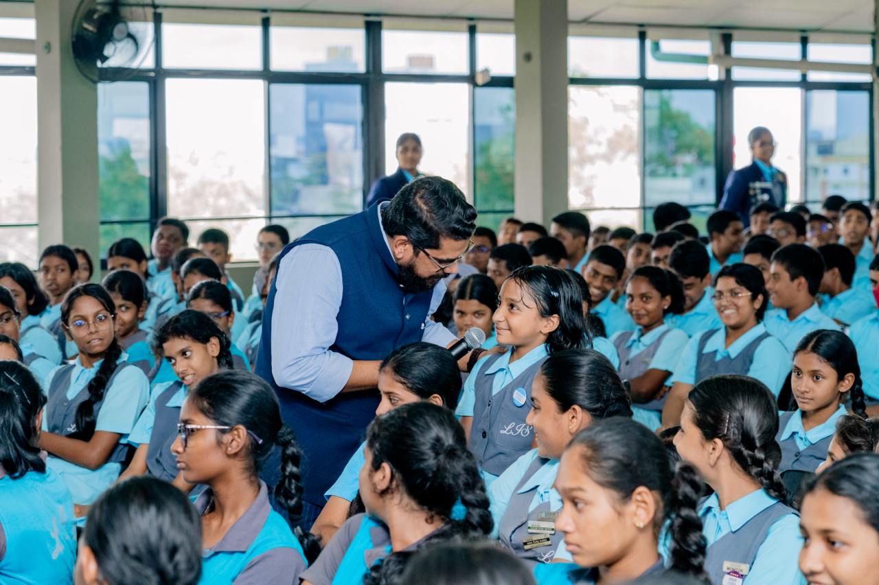 Classroom Q&A: Engaged students and teacher in focused learning session.