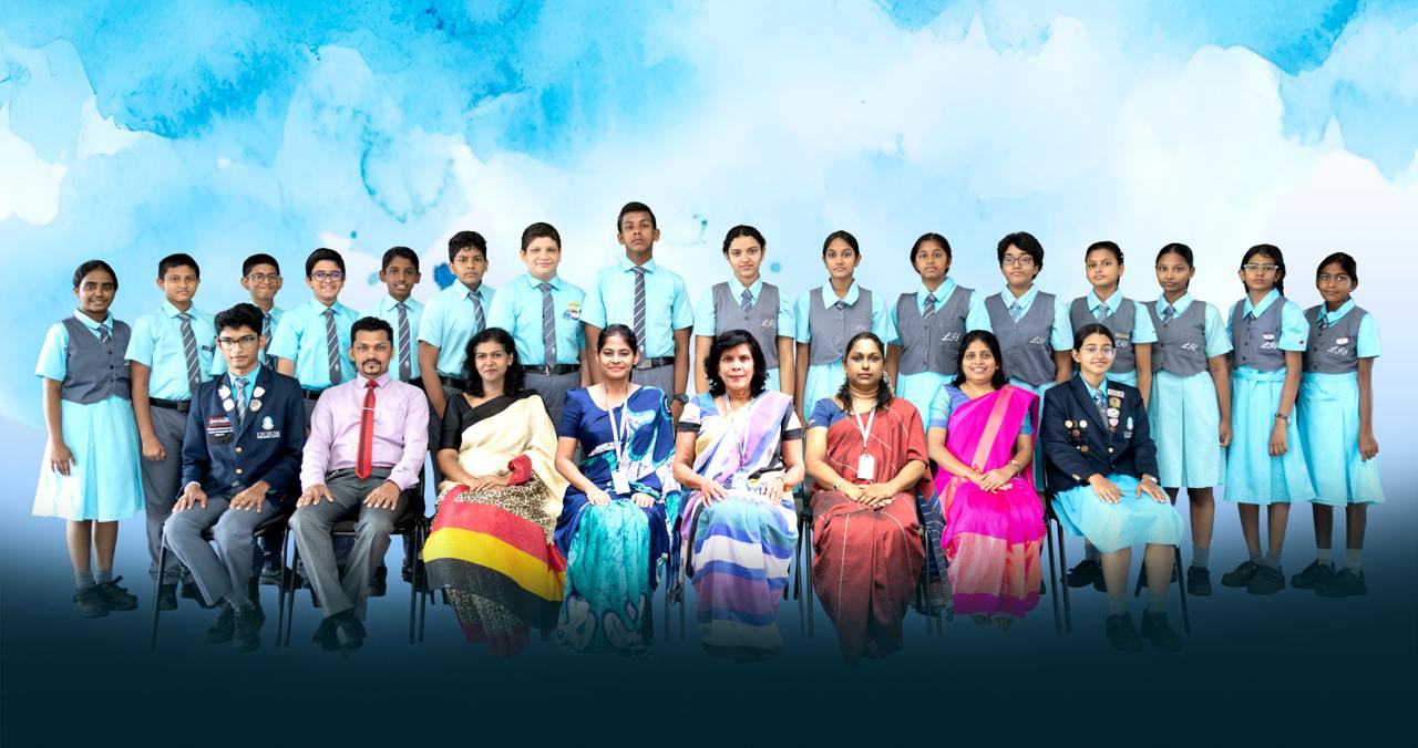 Formal school group photo with diverse adults and uniformed students, celebrating community spirit.