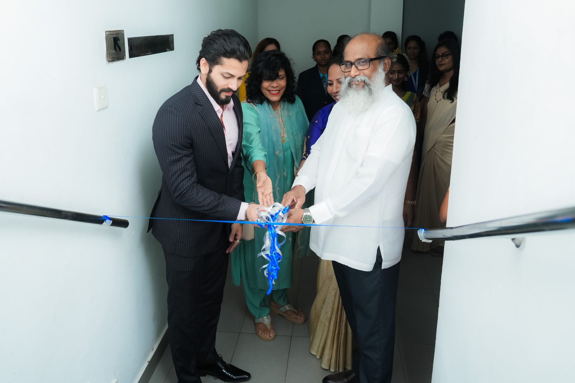 art exhibition ribbon cutting