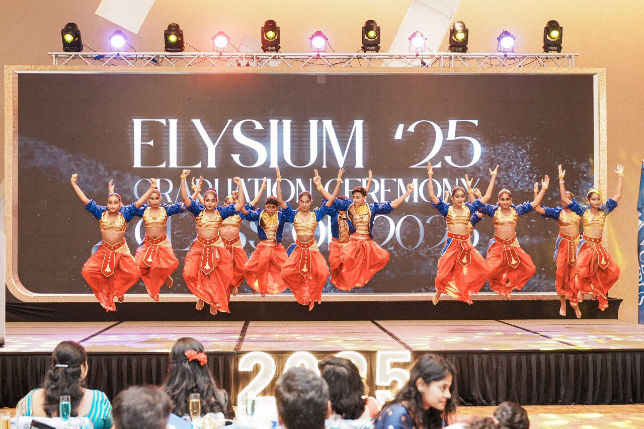 Vibrant Dance Performance at Elysium 2025 Graduation Ceremony Colorful graduation stage dance performance Elysium 2025, traditional costumes, lively ceremony event.