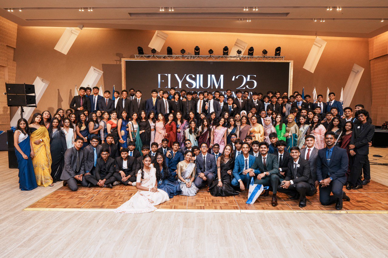 Elysium 2025 Graduation Celebration Group Photo Elysium 2025 graduation group photo with students in formal attire at school event celebration.