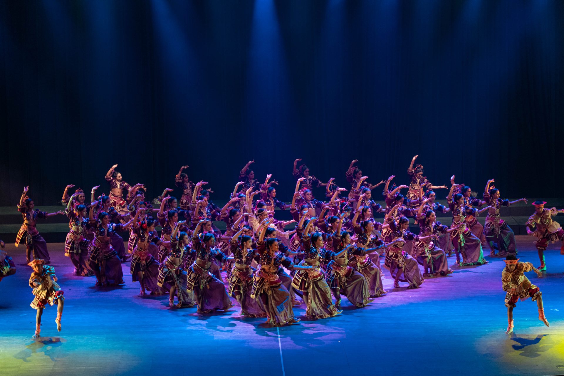synchronized dancers traditional costumes