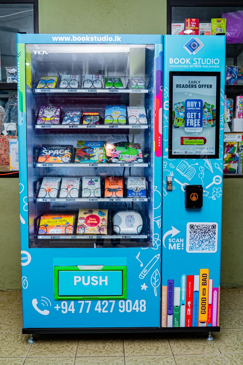 Blue book vending machine for kids and students in Sri Lanka, offering educational books and deals.